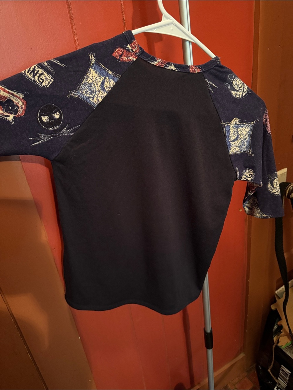 LuLaRoe Black Stretchy Tee with Nightmare Before Christmas Characters. - Picture 4 of 11